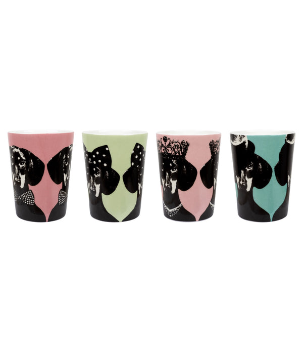 Side view of all Together mugs by Studio Lisa Bengtsson - featuring dog portraits with crowns, hats and accessories on colorful backgrounds